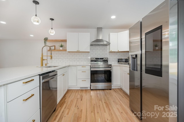 6301 Vernedale Rd, Charlotte, NC 28212 - kitchen with stainless steel appliances, wall chimney exhaust hood, a sink, open shelves, and backsplash