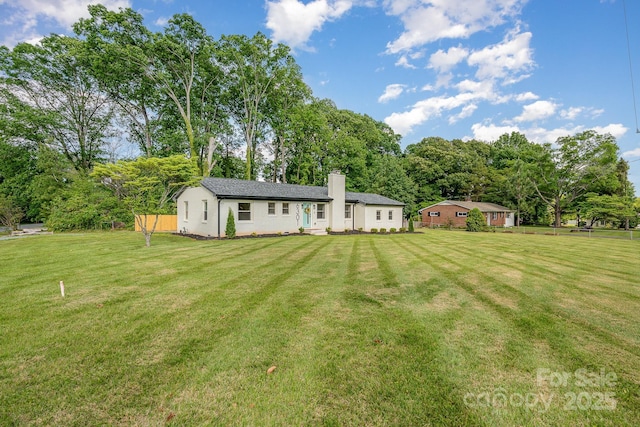 6301 Vernedale Rd, Charlotte, NC 28212 - rear view of house featuring a chimney and a lawn