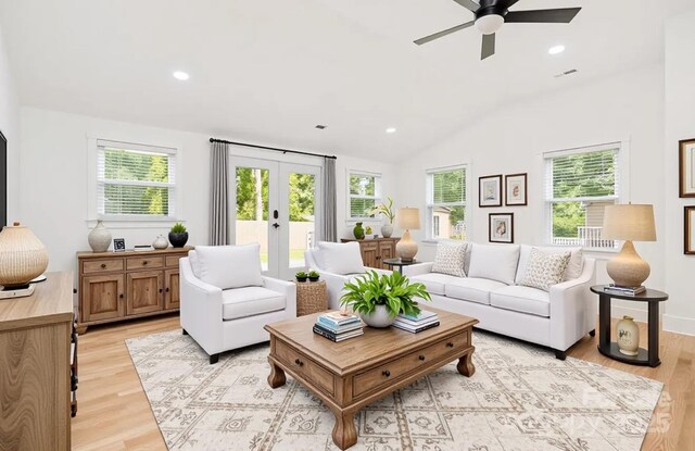 6301 Vernedale Rd, Charlotte, NC 28212 - living area with healthy amount of natural light, french doors, light wood-style floors, a ceiling fan, and lofted ceiling