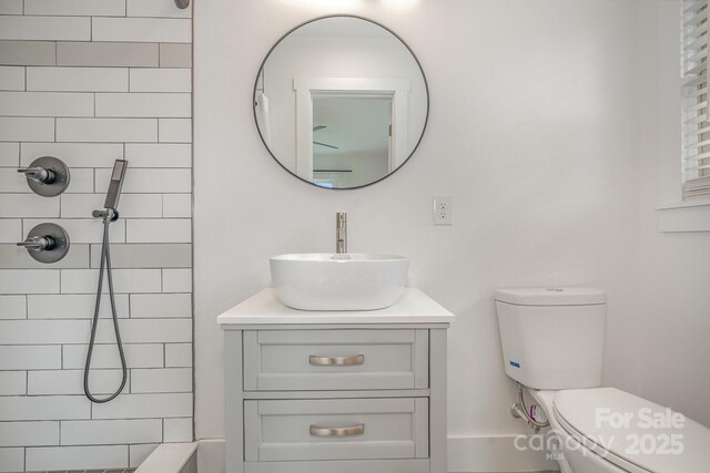 6301 Vernedale Rd, Charlotte, NC 28212 - full bath with tiled shower, toilet, and vanity
