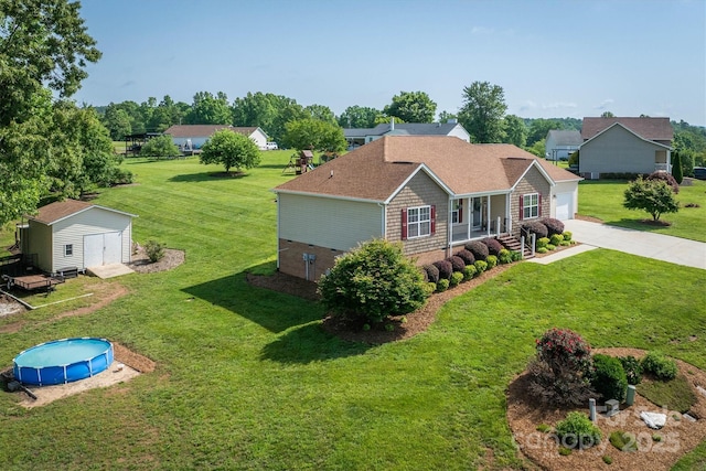 6084 Little River Ct, Granite Falls, NC 28630 - view of side of property featuring a yard, a garage, concrete driveway, and an outdoor pool