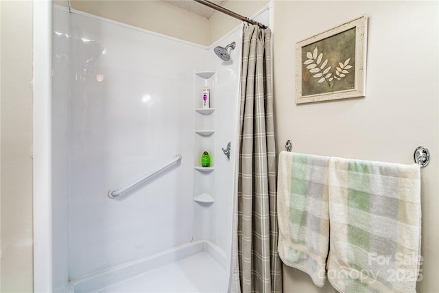 bathroom with a shower with curtain