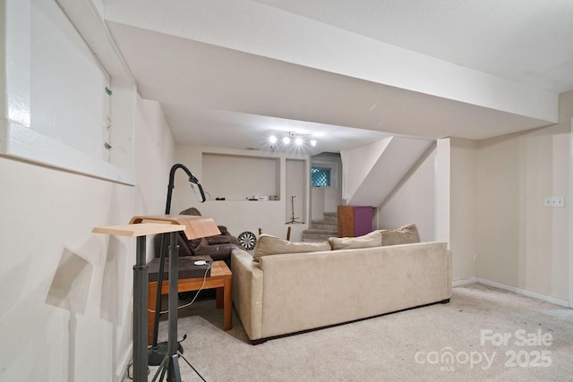 living area featuring carpet flooring and stairs