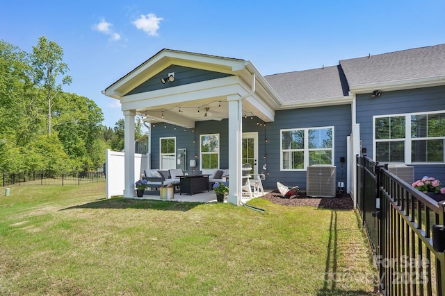 back of property with a patio area, fence, cooling unit, a yard, and outdoor lounge area
