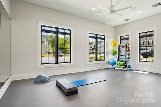 workout area with visible vents, recessed lighting, and baseboards