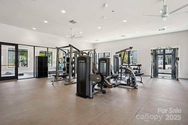 workout area with recessed lighting, a ceiling fan, wood finished floors, and visible vents