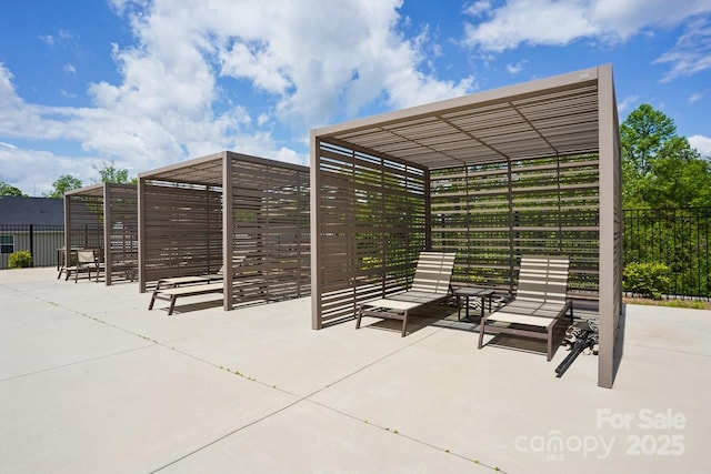 view of home's community with a patio and fence