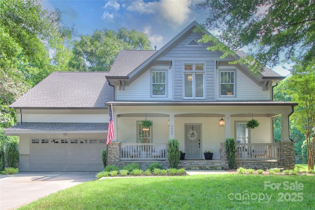 3009 Thayer Dr, Waxhaw, NC 28173 - view of front of house featuring a porch, a garage, driveway, and a front lawn