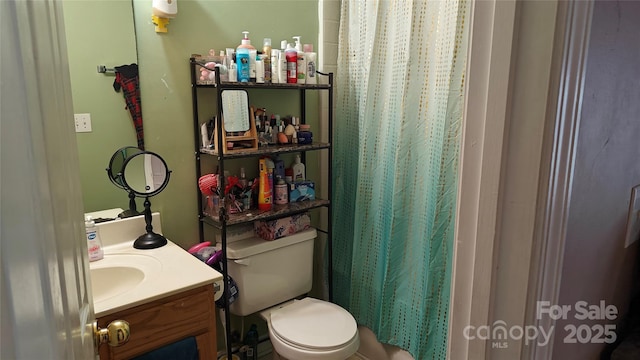 8524 Stoneman Pl, Charlotte, NC 28217 - bathroom with toilet, curtained shower, and vanity