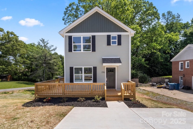 236 Elizabeth Ave, Forest City, NC 28043 - view of front of property featuring a patio, board and batten siding, and a deck