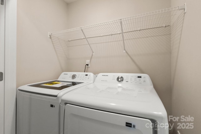 236 Elizabeth Ave, Forest City, NC 28043 - laundry room with washing machine and clothes dryer
