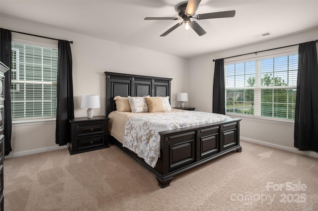 9613 Fire Bellied Ct, Lancaster, SC 29720 - bedroom with light carpet, baseboards, and a ceiling fan