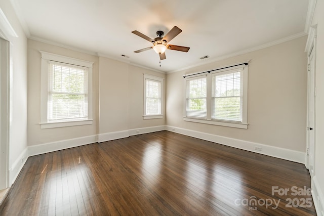 spare room with baseboards, dark wood-style flooring, ceiling fan, and a wealth of natural light