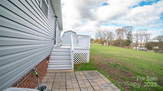 view of yard featuring stairs and a wooden deck