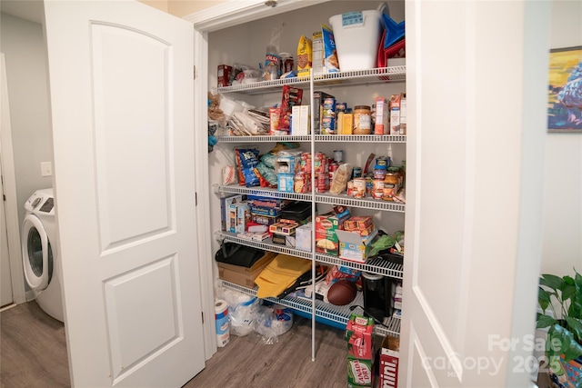 storage area featuring washer / clothes dryer