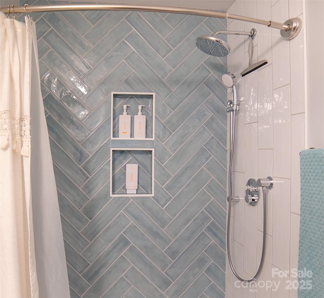 full bath featuring a tile shower