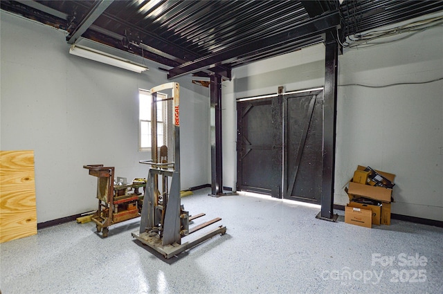 exercise area with baseboards