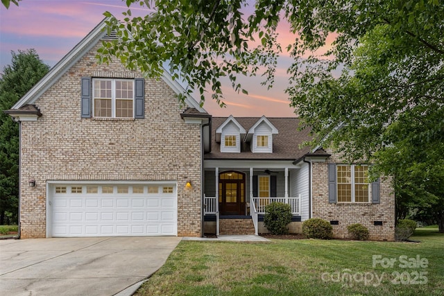 14807 Middlesborough Dr, Matthews, NC 28104 - traditional-style home with a porch, driveway, a yard, crawl space, and a garage