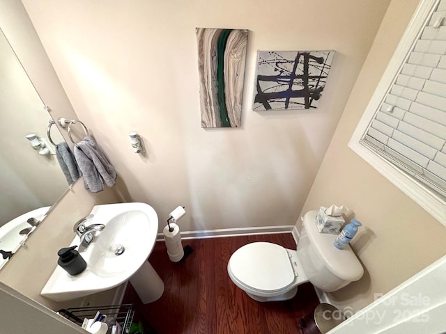 9832 Longstone Ln, Charlotte, NC 28277 - bathroom with wood finished floors, toilet, and a sink