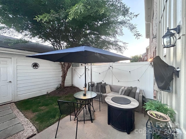 9832 Longstone Ln, Charlotte, NC 28277 - view of patio / terrace with a fenced backyard and a fire pit