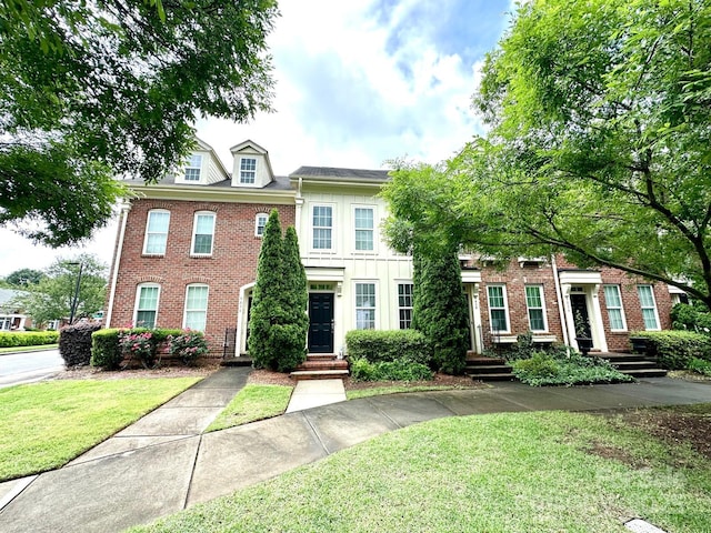 9832 Longstone Ln, Charlotte, NC 28277 - view of front of house with brick siding and a front yard