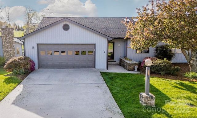 single story home with an attached garage, a shingled roof, a front lawn, and driveway