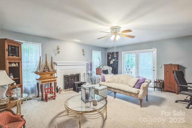 3585 Goodman Lake Rd, Salisbury, NC 28146 - carpeted living area with a fireplace and a ceiling fan