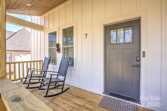 7 Mountain View Ave, Black Mountain, NC 28711 - property entrance with covered porch and board and batten siding