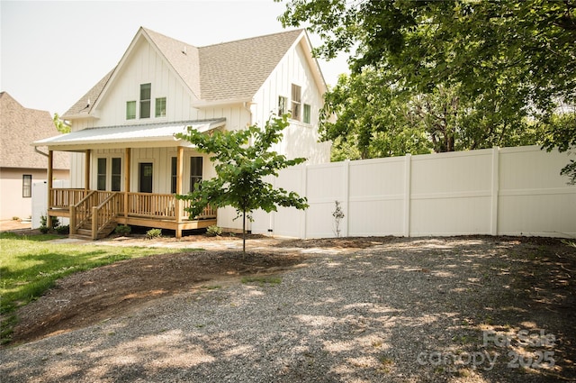 7 Mountain View Ave, Black Mountain, NC 28711 - back of house featuring covered porch, roof with shingles, and board and batten siding