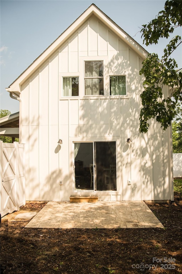 7 Mountain View Ave, Black Mountain, NC 28711 - back of house featuring board and batten siding and a patio