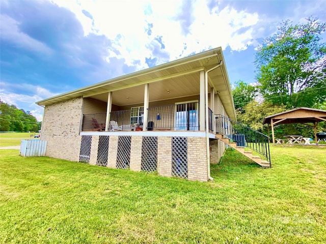 970 Mt Moriah Church Rd, China Grove, NC 28023 - back of property with stairway, brick siding, a yard, and a gazebo