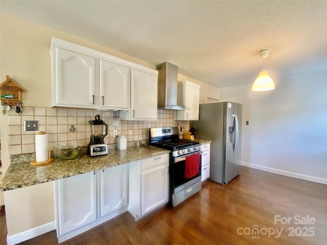 970 Mt Moriah Church Rd, China Grove, NC 28023 - kitchen with wall chimney range hood, appliances with stainless steel finishes, white cabinets, and tasteful backsplash