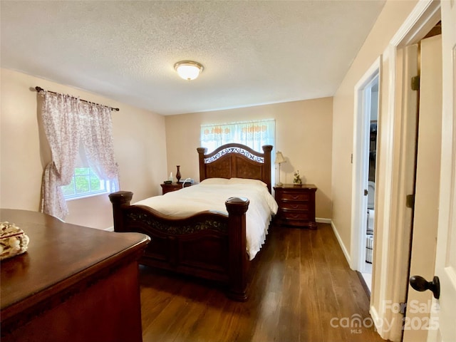 970 Mt Moriah Church Rd, China Grove, NC 28023 - bedroom with baseboards, a textured ceiling, and wood finished floors