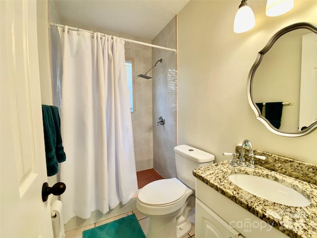 970 Mt Moriah Church Rd, China Grove, NC 28023 - bathroom featuring toilet, a tile shower, tile patterned flooring, and vanity