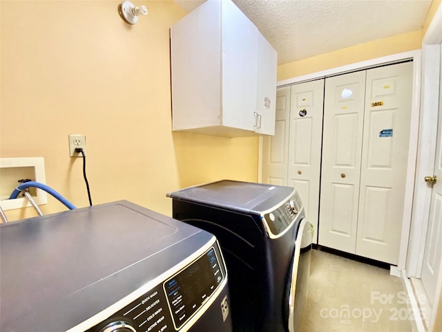 970 Mt Moriah Church Rd, China Grove, NC 28023 - washroom with cabinet space, a textured ceiling, and washing machine and dryer