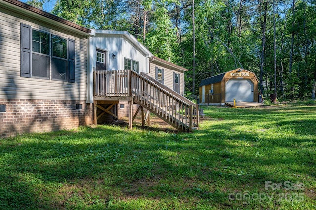 exterior space with an outbuilding, stairway, and a shed