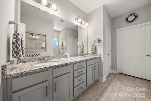 3588 County Down Ave, Kannapolis, NC 28081 - full bath with a walk in shower, double vanity, tile patterned flooring, and baseboards