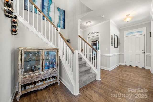 3588 County Down Ave, Kannapolis, NC 28081 - entrance foyer featuring wood finished floors, stairs, ornamental molding, and baseboards