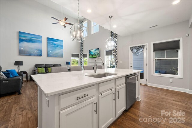 3588 County Down Ave, Kannapolis, NC 28081 - kitchen with a sink, open floor plan, stainless steel dishwasher, healthy amount of natural light, and a high ceiling