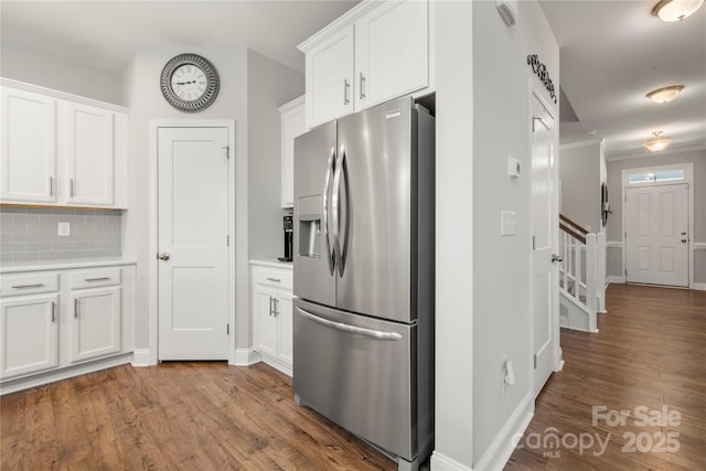 3588 County Down Ave, Kannapolis, NC 28081 - kitchen with stainless steel fridge, white cabinetry, and wood finished floors
