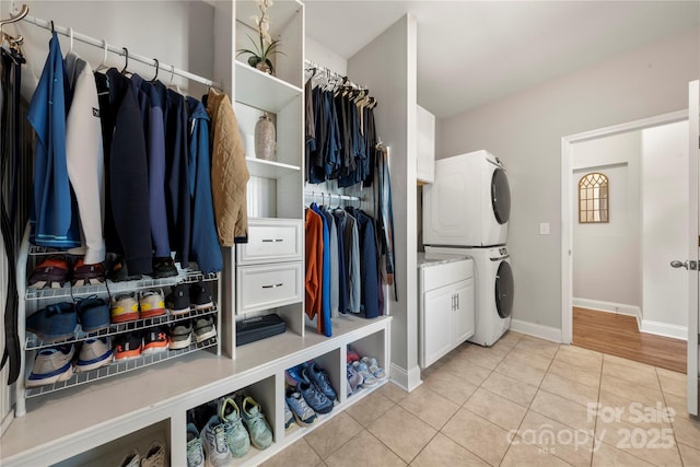 3588 County Down Ave, Kannapolis, NC 28081 - spacious closet with stacked washing machine and dryer and light tile patterned floors