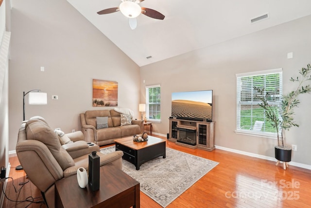 3032 Kilbeggan Dr, Clover, SC 29710 - living area with high vaulted ceiling, ceiling fan, light wood finished floors, and baseboards