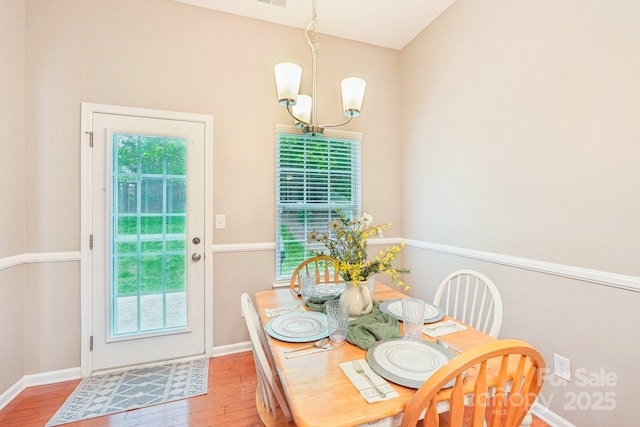 3032 Kilbeggan Dr, Clover, SC 29710 - dining area with a chandelier and wood finished floors