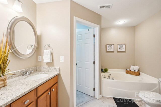 3032 Kilbeggan Dr, Clover, SC 29710 - full bath with vanity and a garden tub