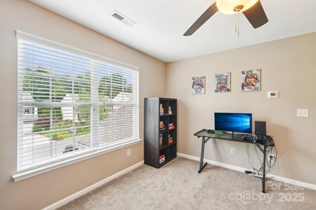 3032 Kilbeggan Dr, Clover, SC 29710 - carpeted home office with baseboards and ceiling fan