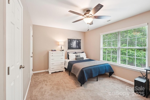 3032 Kilbeggan Dr, Clover, SC 29710 - bedroom with baseboards, light colored carpet, and a ceiling fan