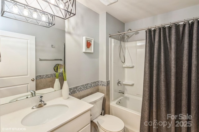 2772 Sherrills Stream Dr, Sherrills Ford, NC 28673 - full bath featuring shower / tub combo, toilet, vanity, and a wainscoted wall
