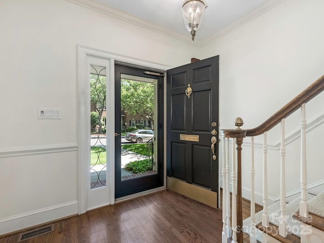 232 Perrin Pl, Charlotte, NC 28207 - entryway featuring stairs, wood finished floors, ornamental molding, and baseboards