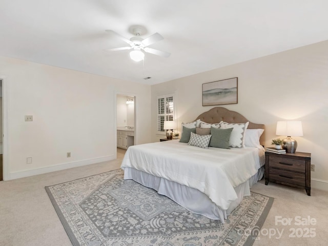 232 Perrin Pl, Charlotte, NC 28207 - bedroom featuring light carpet, baseboards, a ceiling fan, and ensuite bathroom