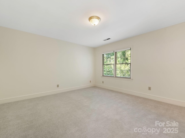 232 Perrin Pl, Charlotte, NC 28207 - unfurnished room featuring light carpet and baseboards
